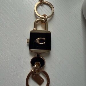 Coach Black and Gold Padlock Key Holder
